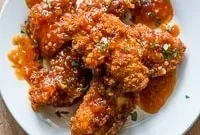 Crispy Asian Chicken Strips with Spicy Garlic Chili Sauce