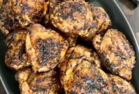 Juicy Grilled Chicken Thighs with Crispy Skin and Garlic Herb Rub