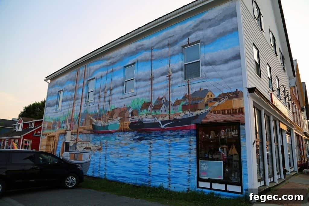 Boat and harbor mural on the side of a buildng in St. Andrews by the Sea