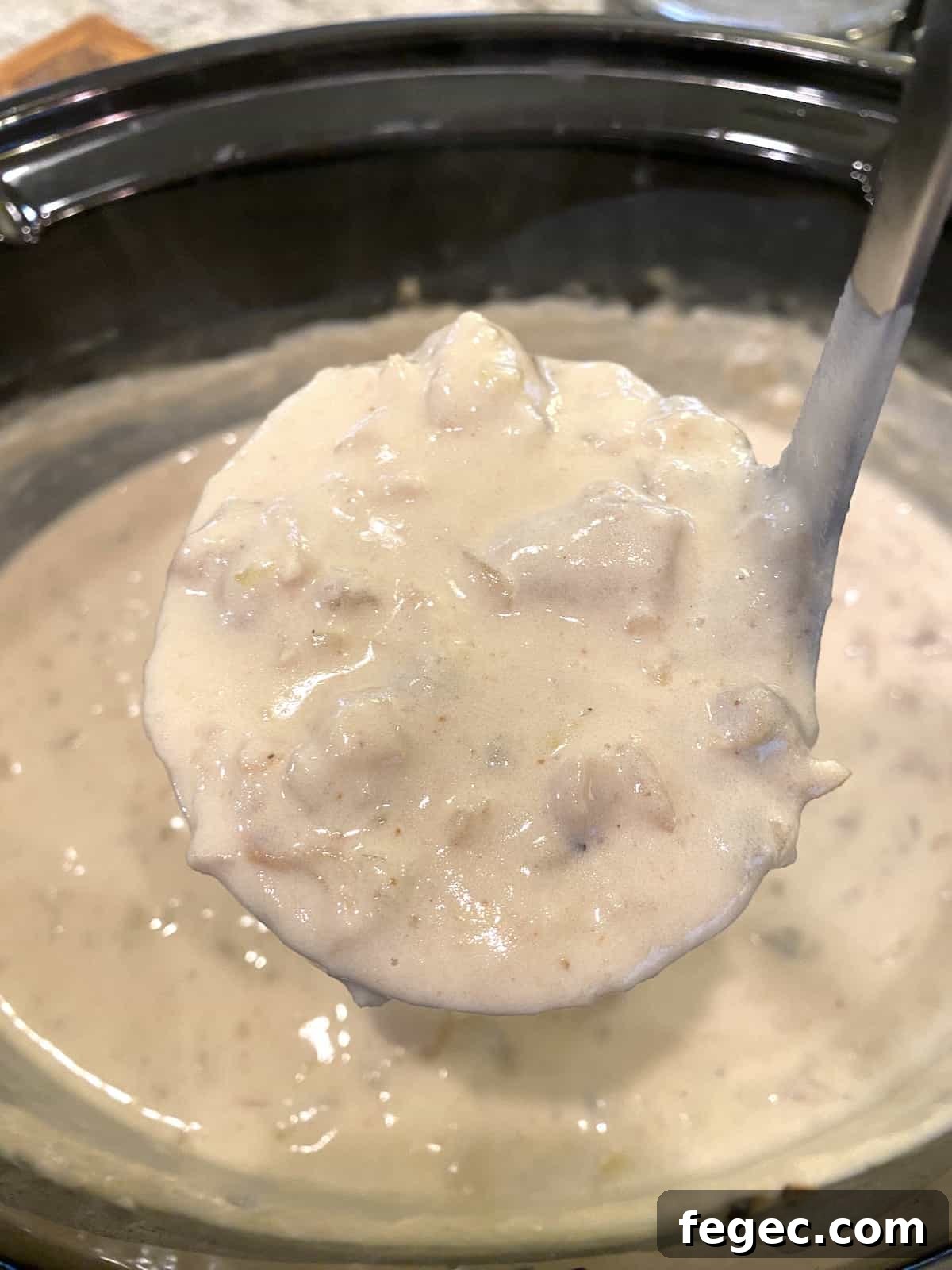A scoop full of clam chowder.