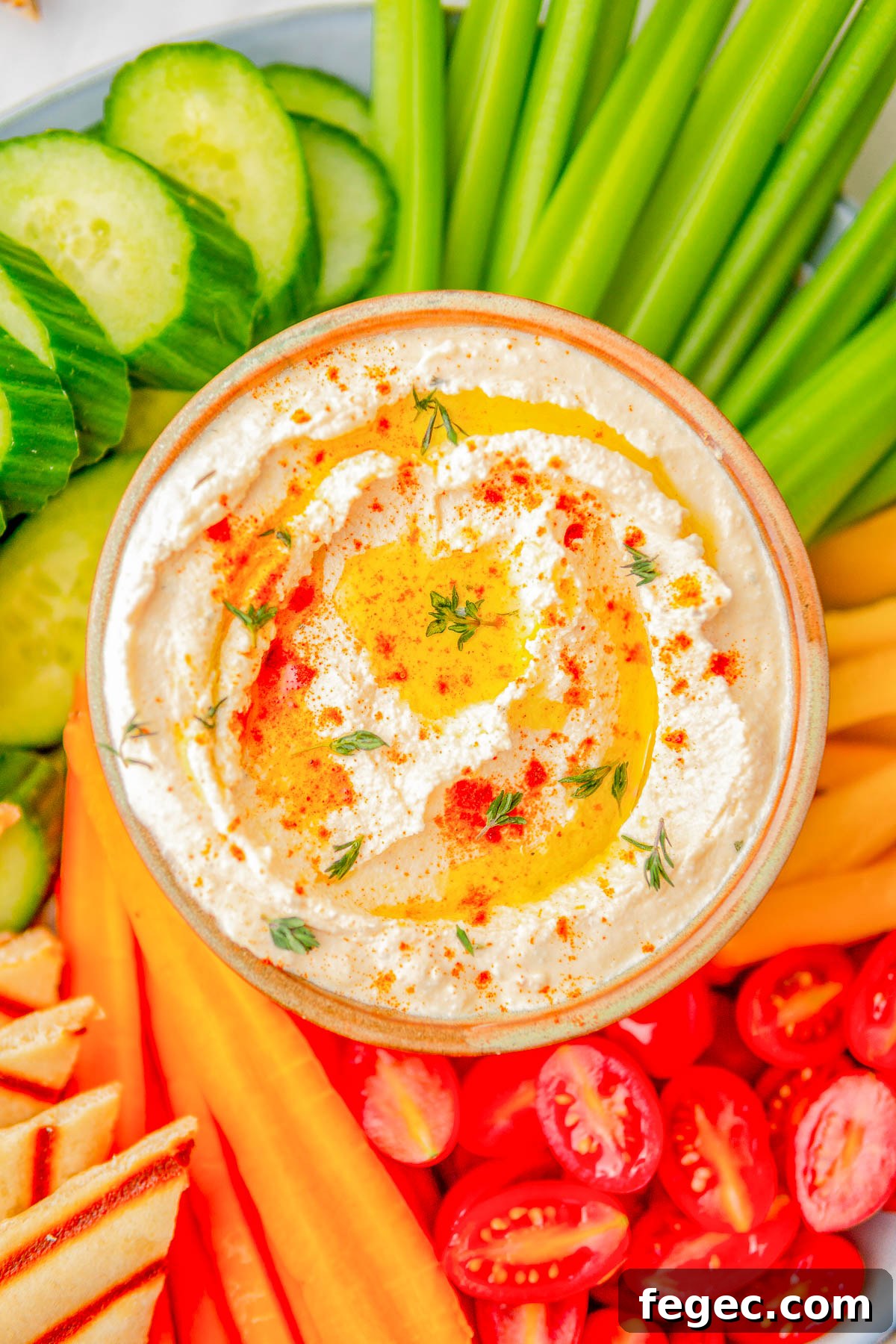 Whipped feta dip on a board