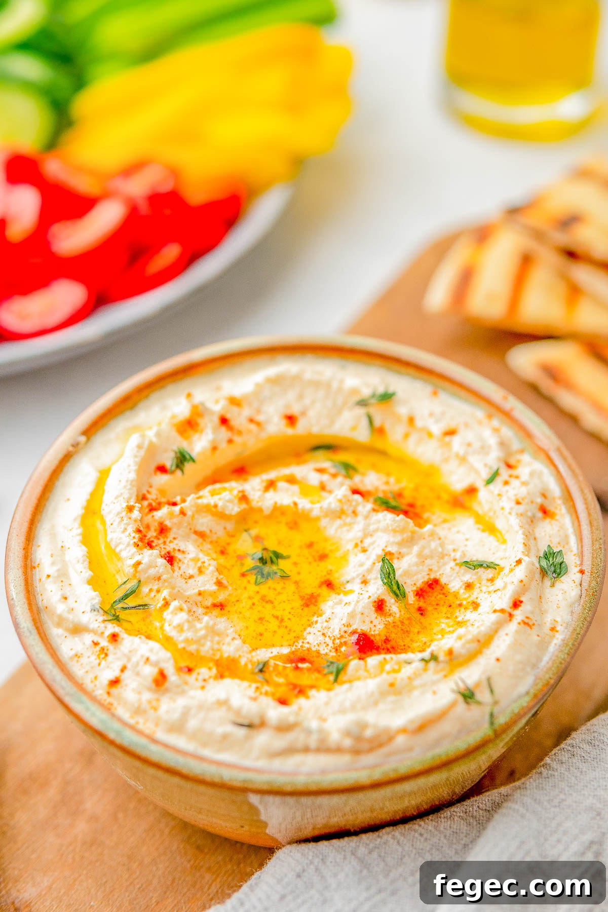 Whipped feta dip on a serving board