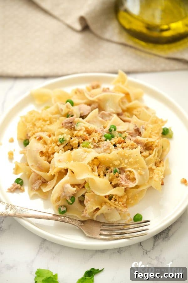 Tuna noodle casserole served on a white plate.
