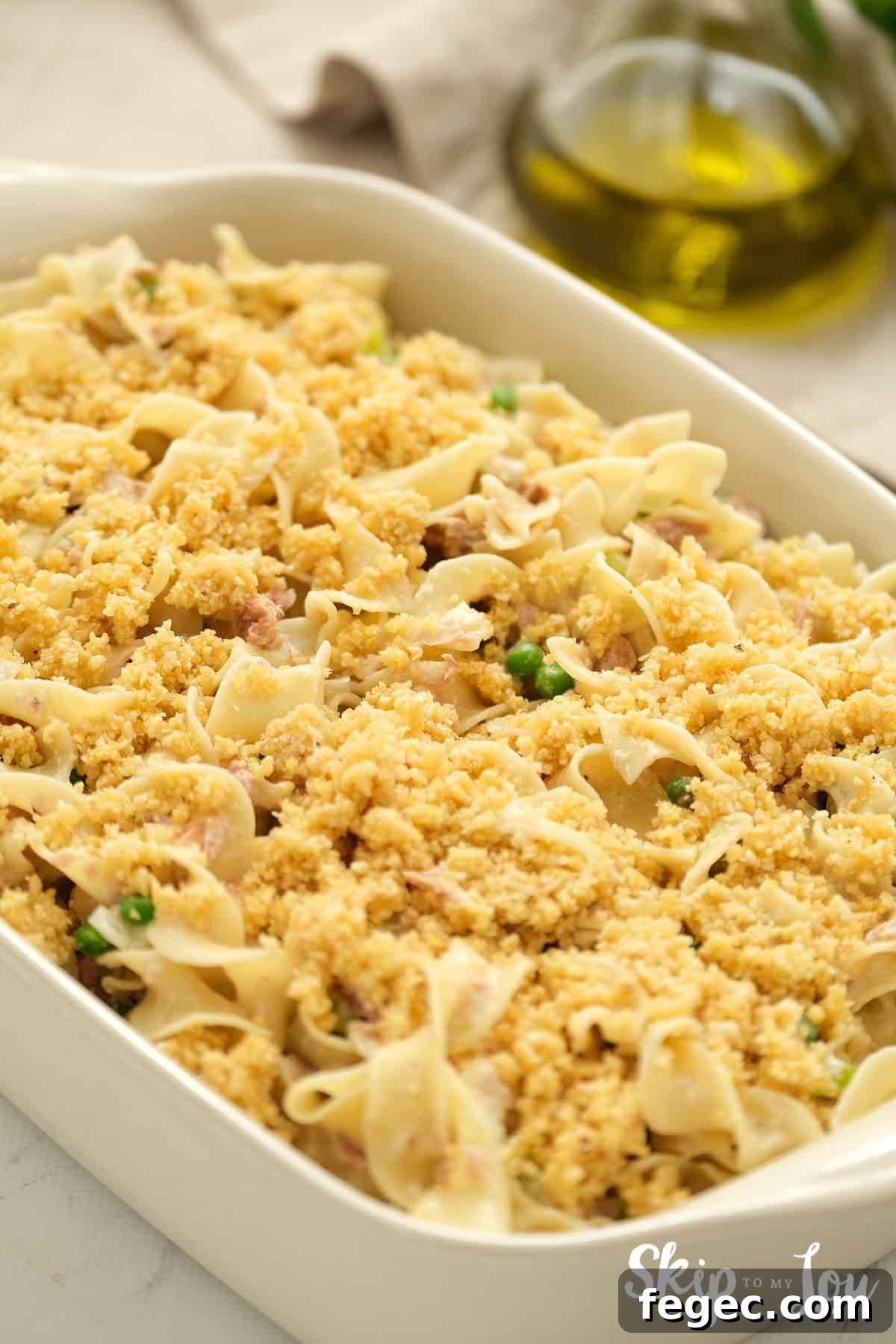 Bread crumbs sprinkled on top of Tuna Noodle Casserole