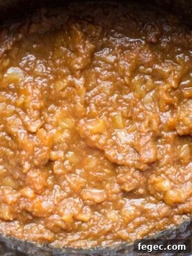 cooked pumpkin applesauce in a slow cooker.