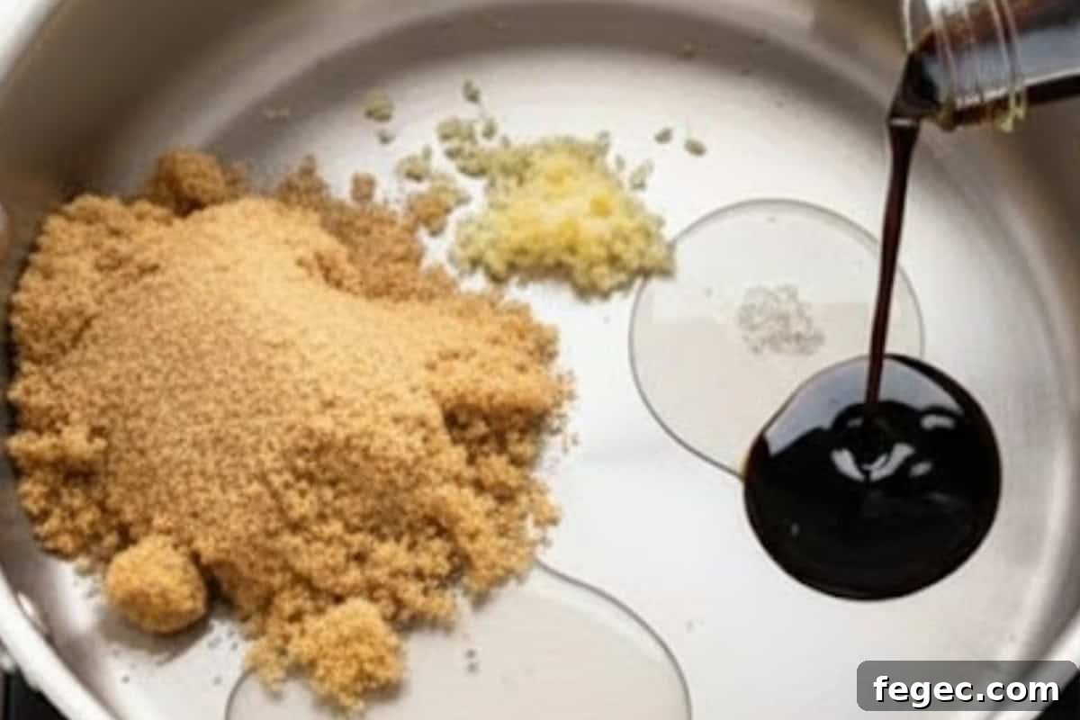 Combine soy sauce, sake, mirin, brown sugar, garlic and water in a sauce pan.