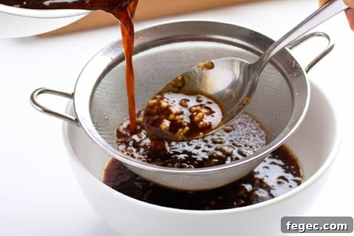 Remove the sauce pan from the heat and remove the garlic and set aside 1/4 of the sauce.