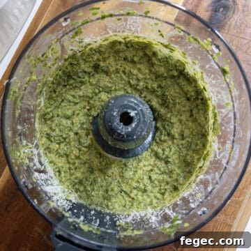 Finished pesto in a food processor.