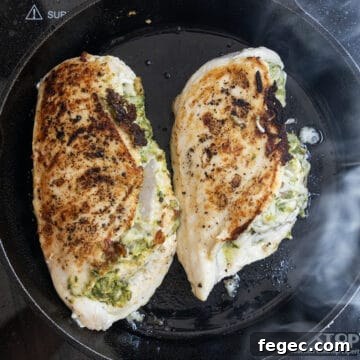 Chicken breast seared on the cast iron.