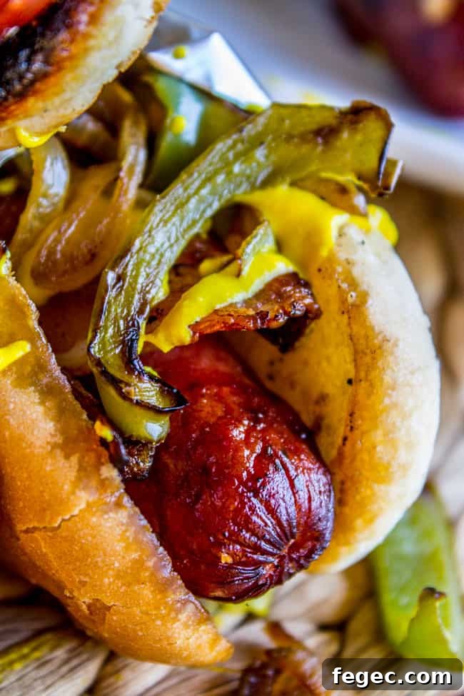 Grilled Bacon-Wrapped Hot Dogs: Crispy, Juicy Summer Recipe 4 Bacon Wrapped Hot Dogs (Grilled) from The Food Charlatan