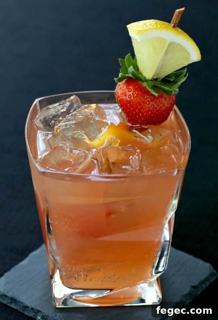 Kentucky Sunset Cocktail with Bulleit Bourbon and garnish