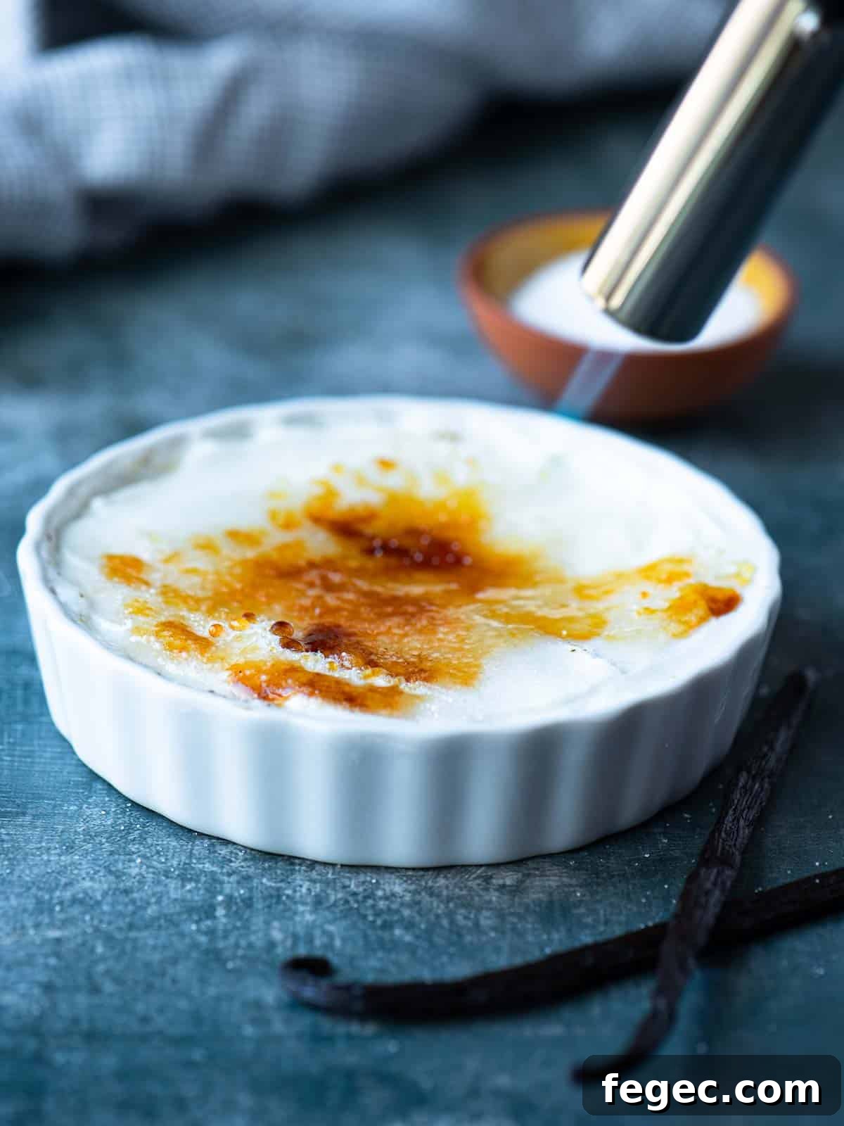 A flame swept over sugar to harden it for yogurt brulee.