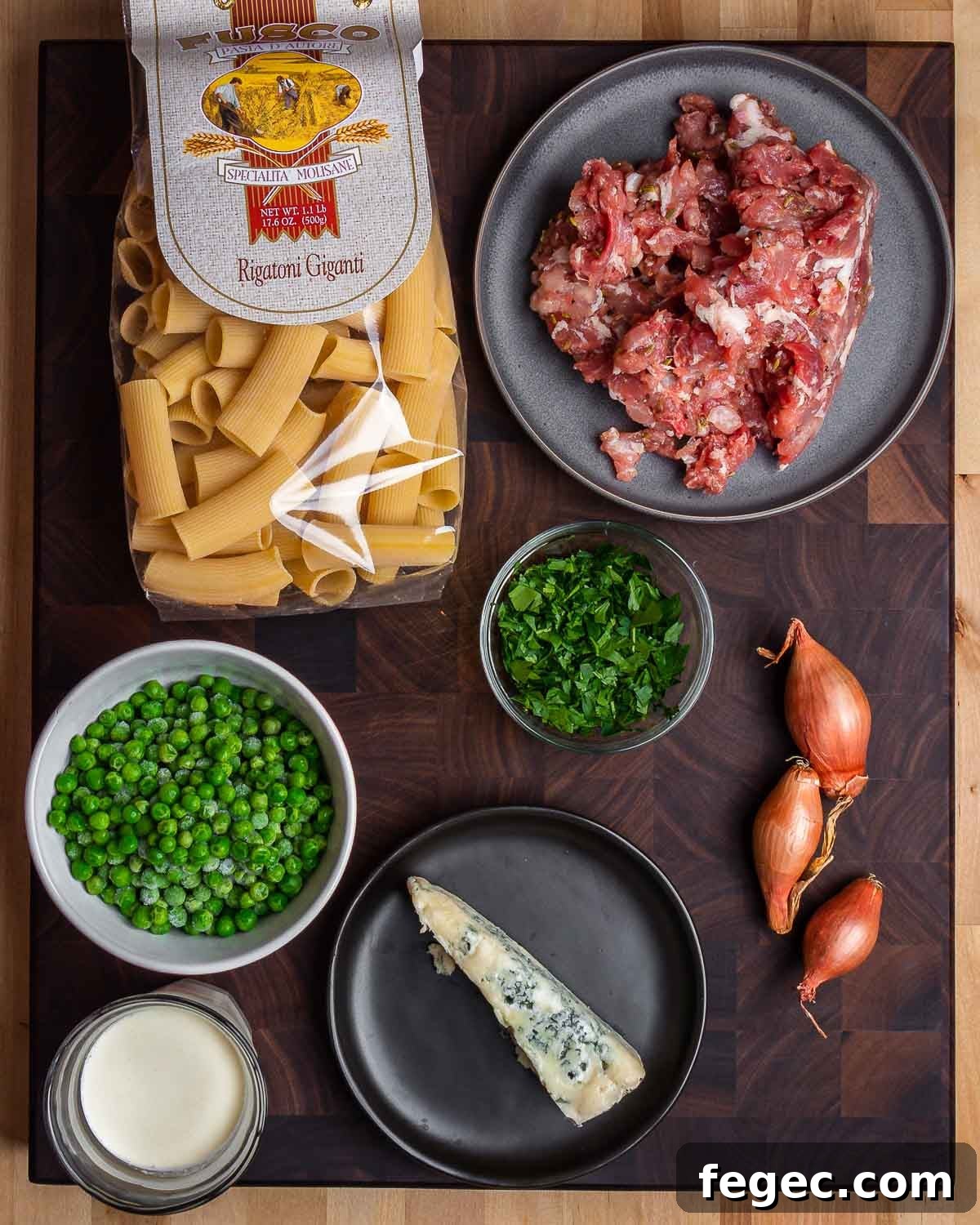 Ingredients shown: rigatoni, Italian sausage, peas, parsley, shallots, gorgonzola, and heavy cream.