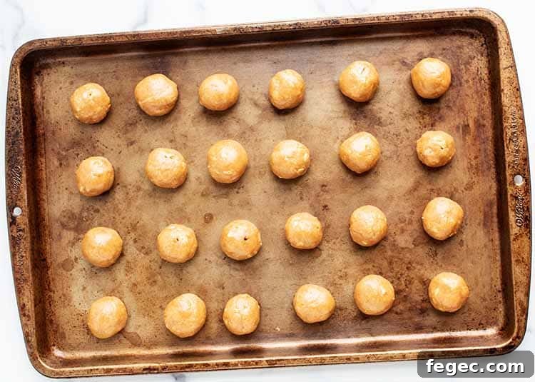3 ingredient peanut butter balls on a baking tray