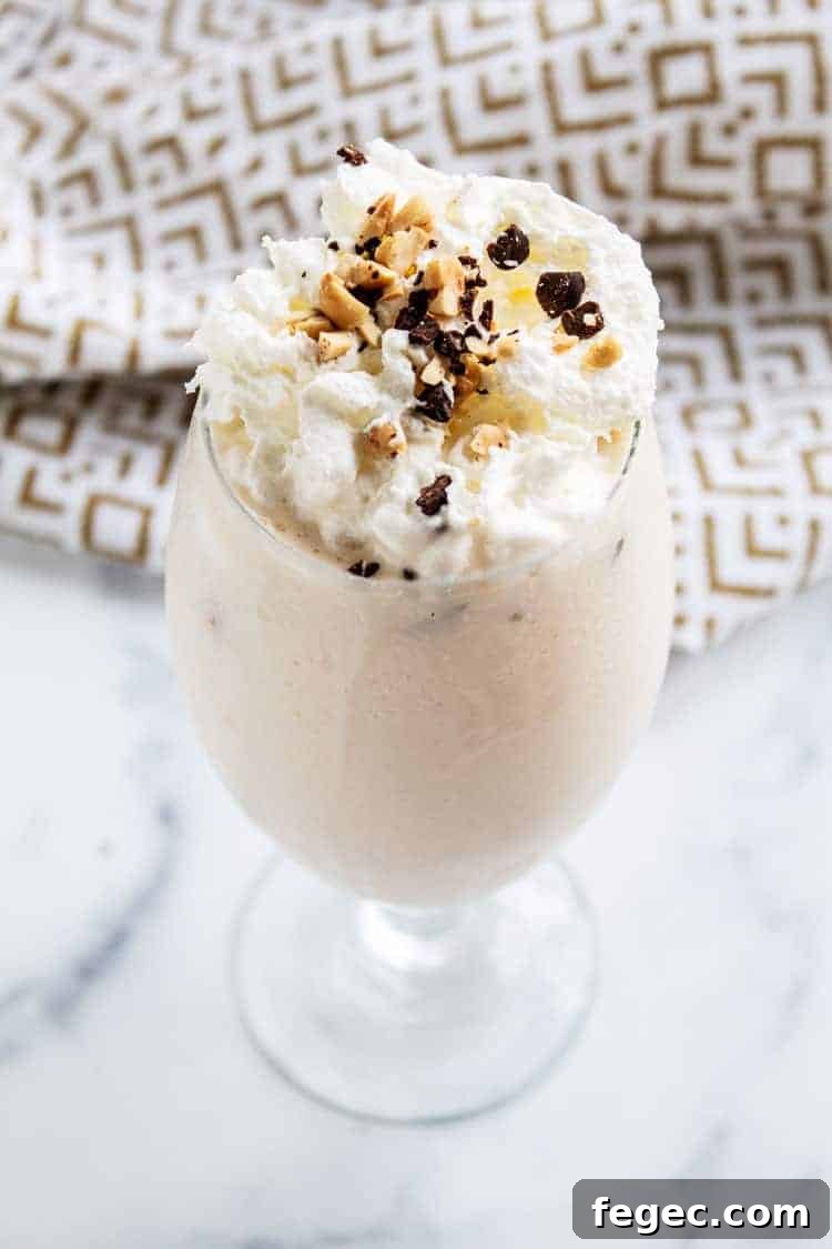 keto peanut butter smoothie with whipped cream on top