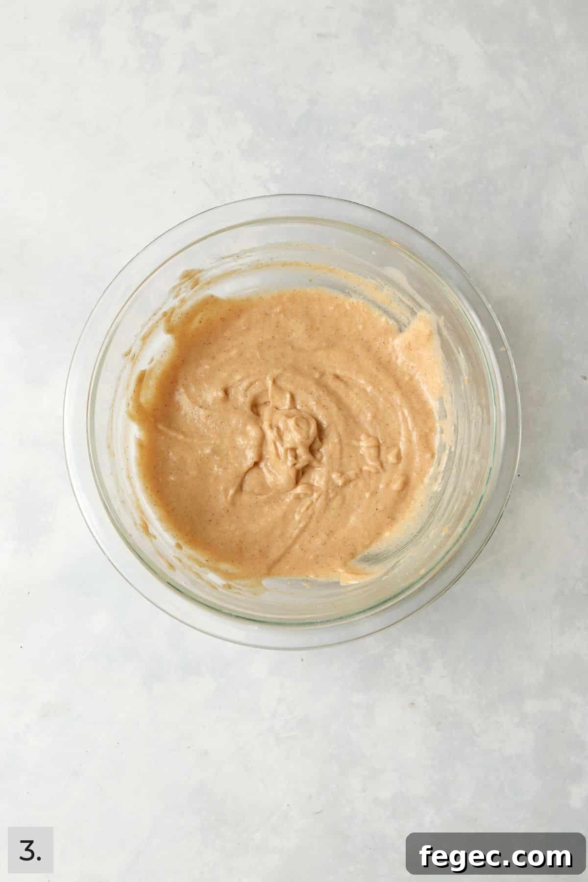 Single-Serve Pumpkin Coffee Cake Recipe (Small Batch) 6 Pumpkin coffee cake batter in a mixing bowl.