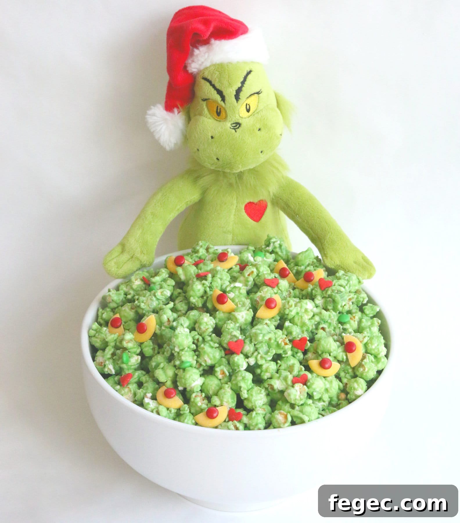 Grinch Popcorn in a white bowl