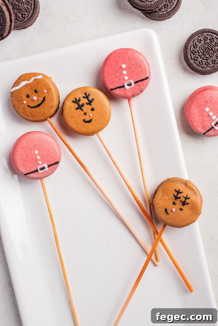 the completed Christmas Oreos Pops on a white serving dish.