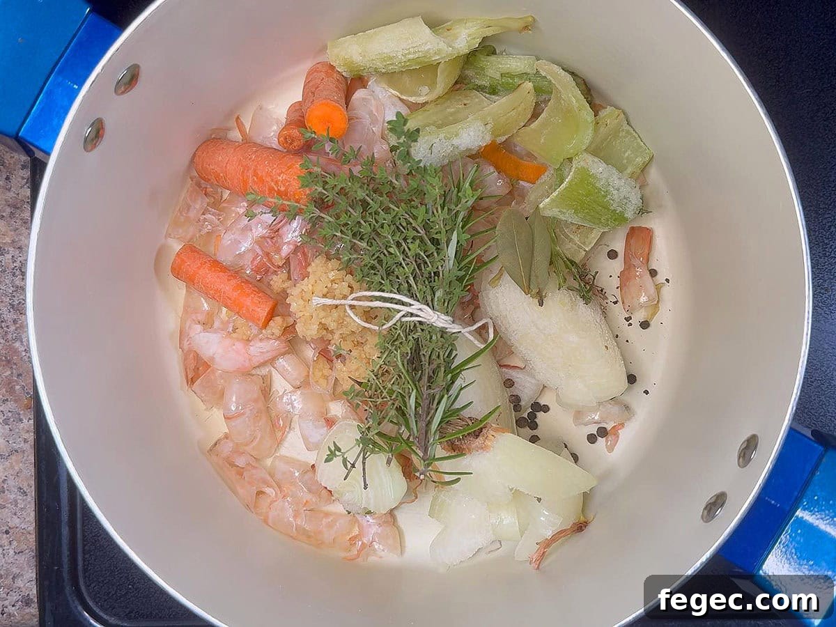 Shrimp stock ingredients in a large stock pot.