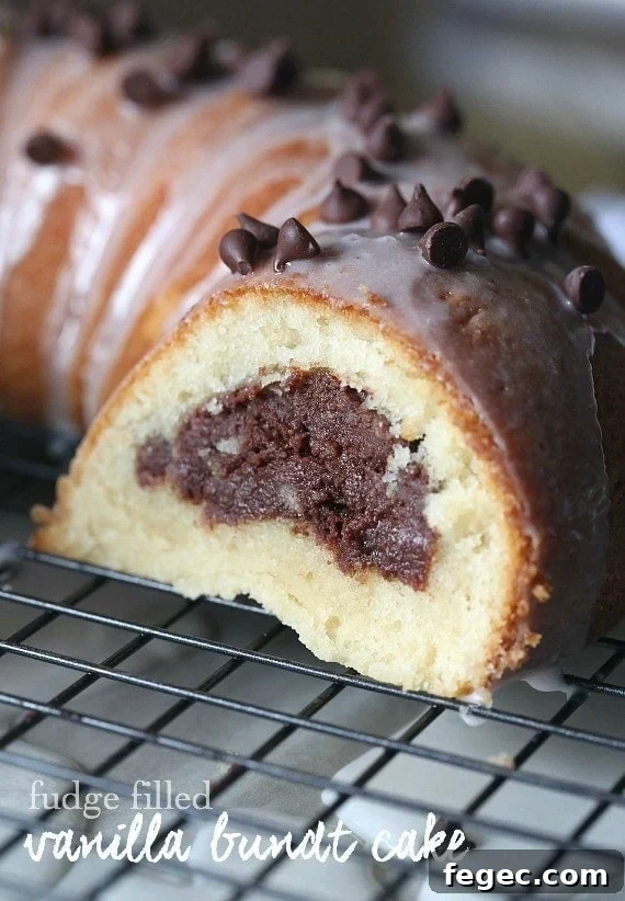 Fudge Filled Vanilla Bundt Cake. Super fudgy cream cheese filling inside a delicious vanilla bundt!