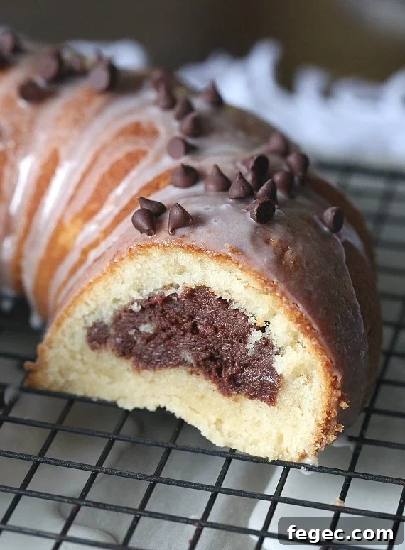 Fudge Filled Vanilla Bundt Cake. Super fudgy filling inside a delicious vanilla bundt!