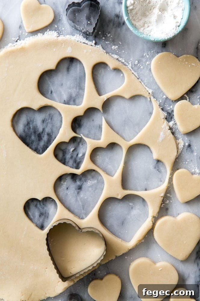 Cream cheese sugar cookie dough rolled out and cut into hearts