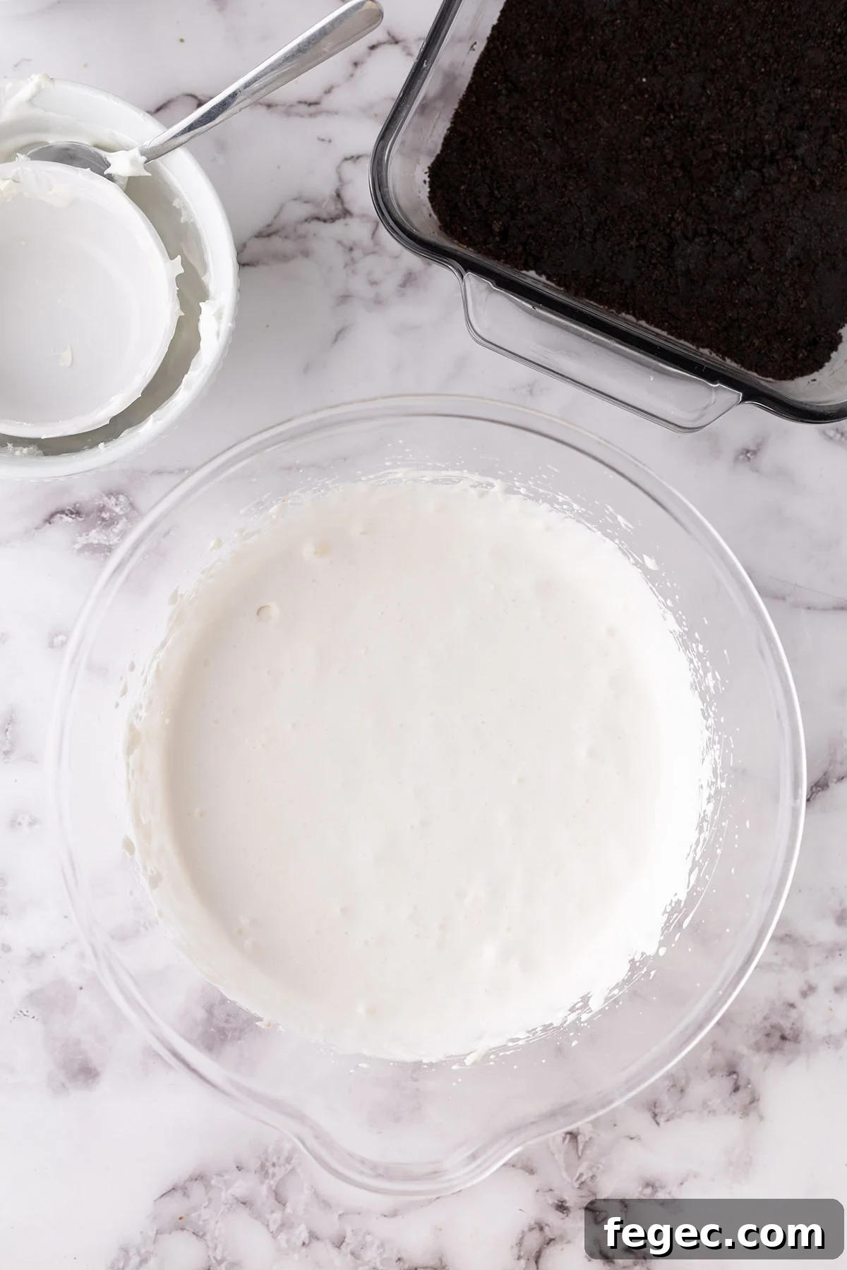 Vanilla cool whip mixture in a mixing bowl.