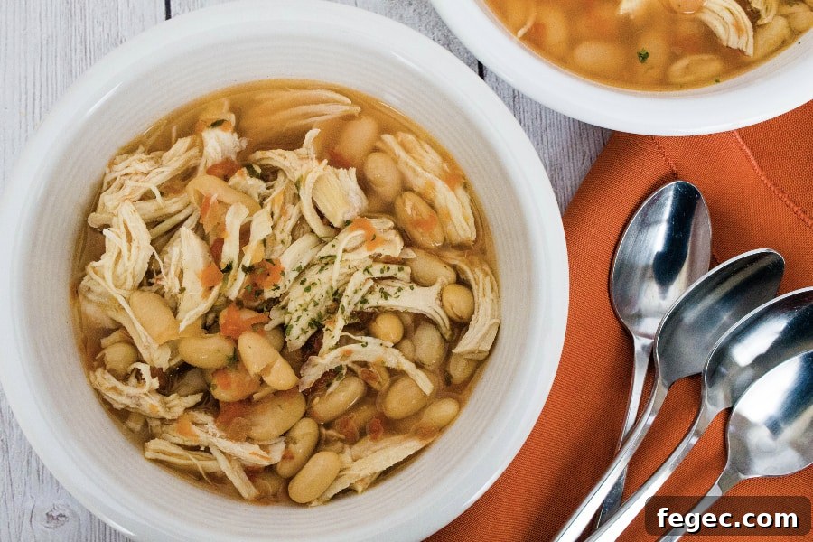 white bowl filled with white chicken chili made in the Instant Pot pressure cooker