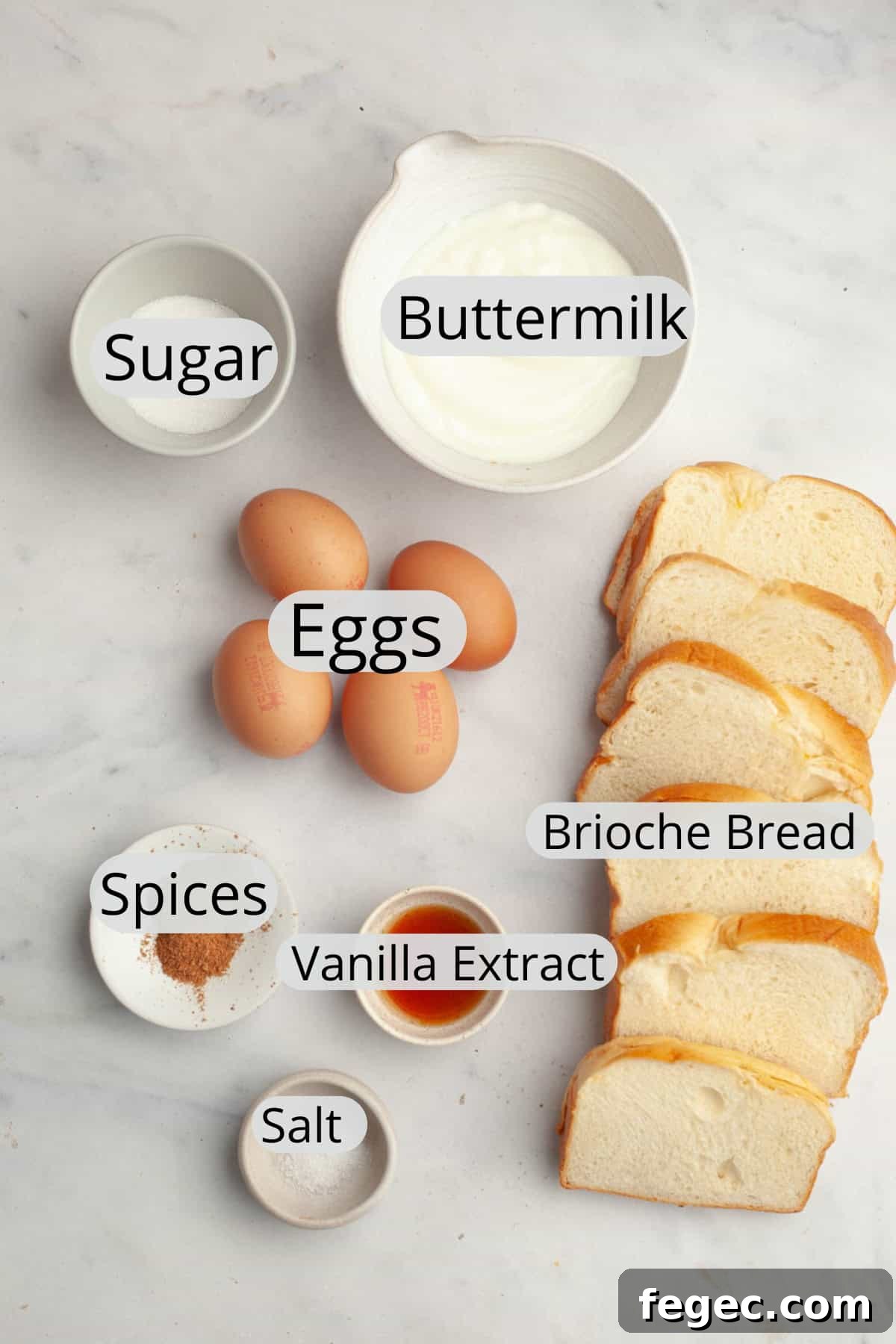 All the ingredients needed to make buttermilk french toast, weighed out into small bowls.