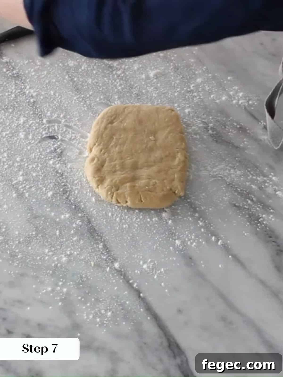 Chilled almond dough on countertop, ready for the next baking step.