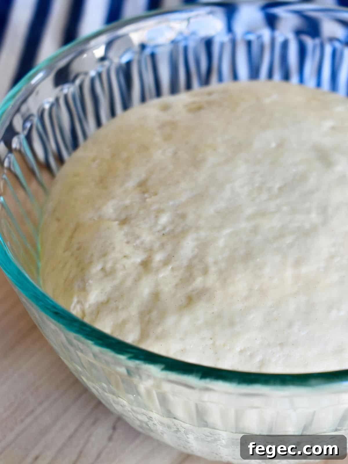 Small Batch Pizza Dough in a glass bowl.