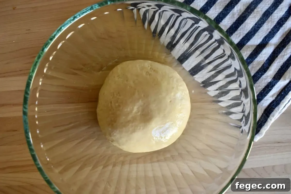 Recipe in a glass bowl for first rise.