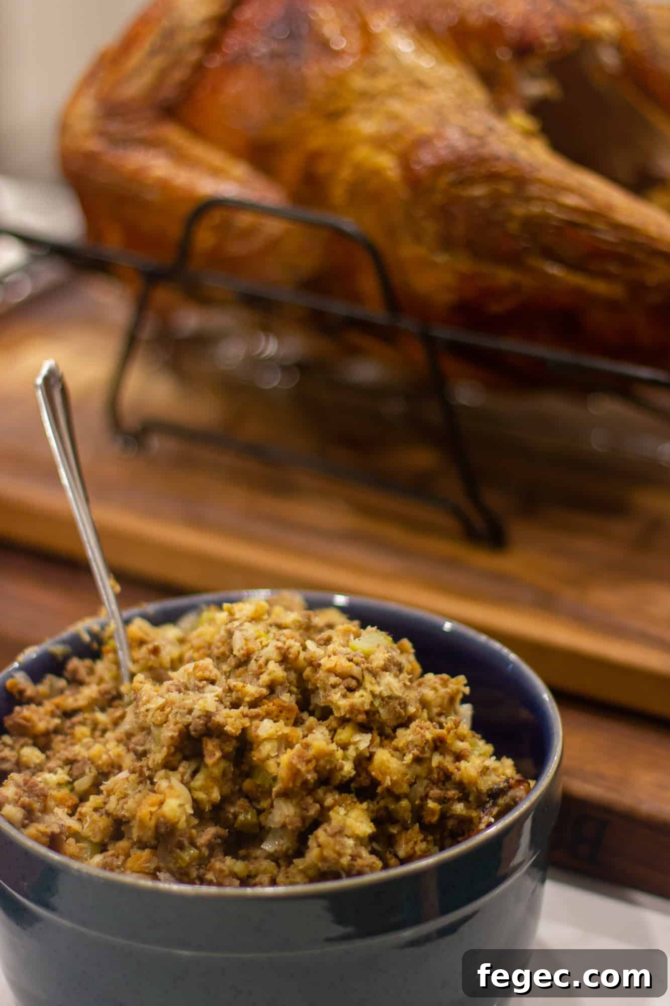Classic Homemade Turkey Stuffing Recipe from Mom 2 Turkey stuffing recipe made with ground beef, onion, celery and stuffing mix. The perfect stuffing for holiday dinners like christmas and thanksgiving.