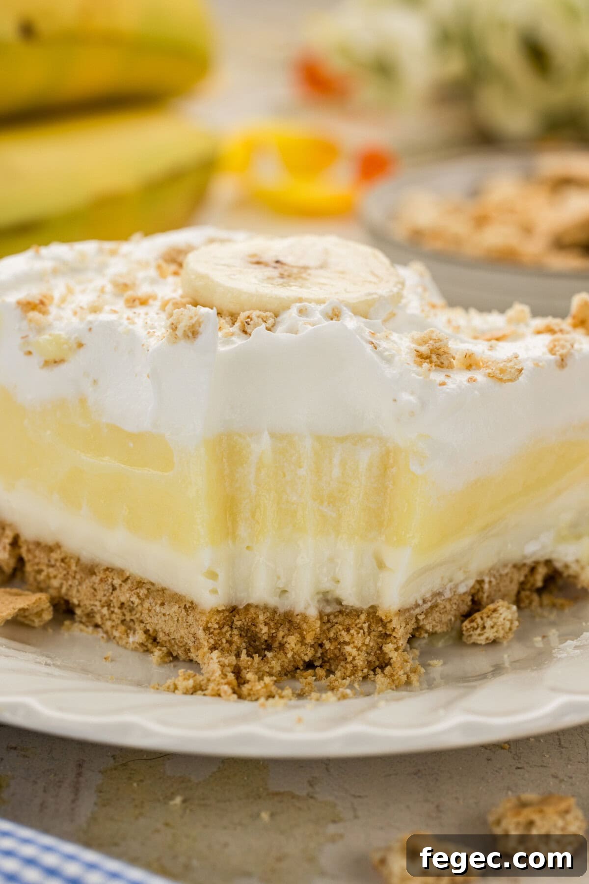 slice of Banana Cream Lush with bite out of it