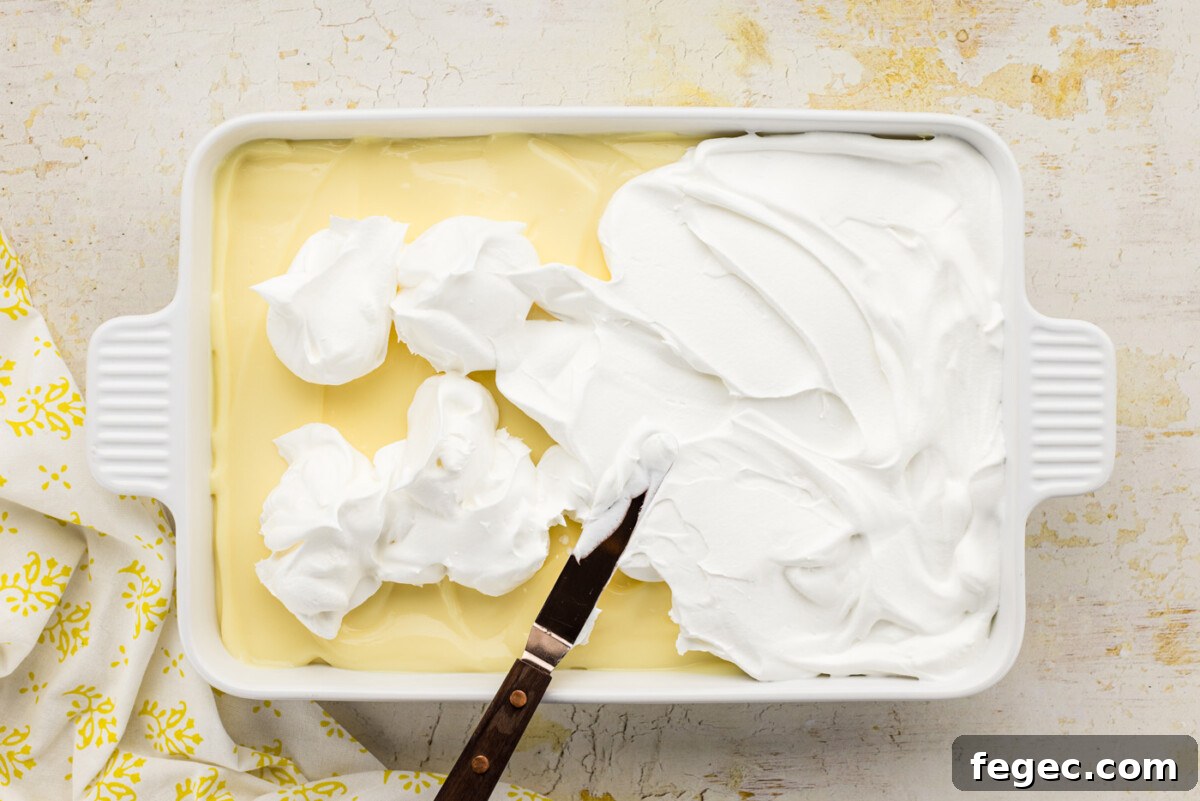 whipped cream spread over dessert
