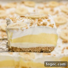 spatula lifting a slice of Banana Cream Lush