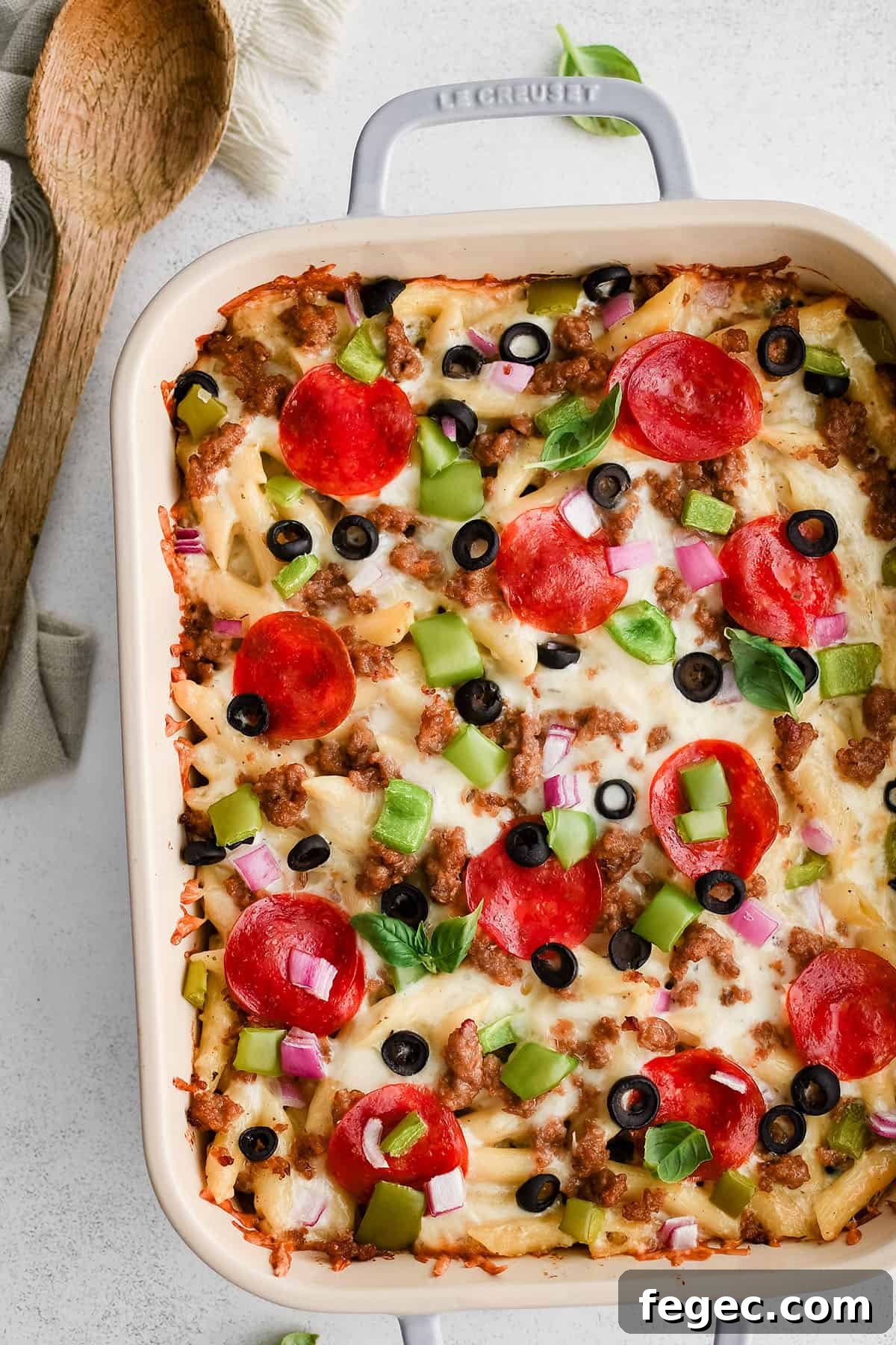 Creamy White Pizza Pasta Bake Recipe — Cheesy Italian Dinner 2 white pizza pasta bake in a large baking dish