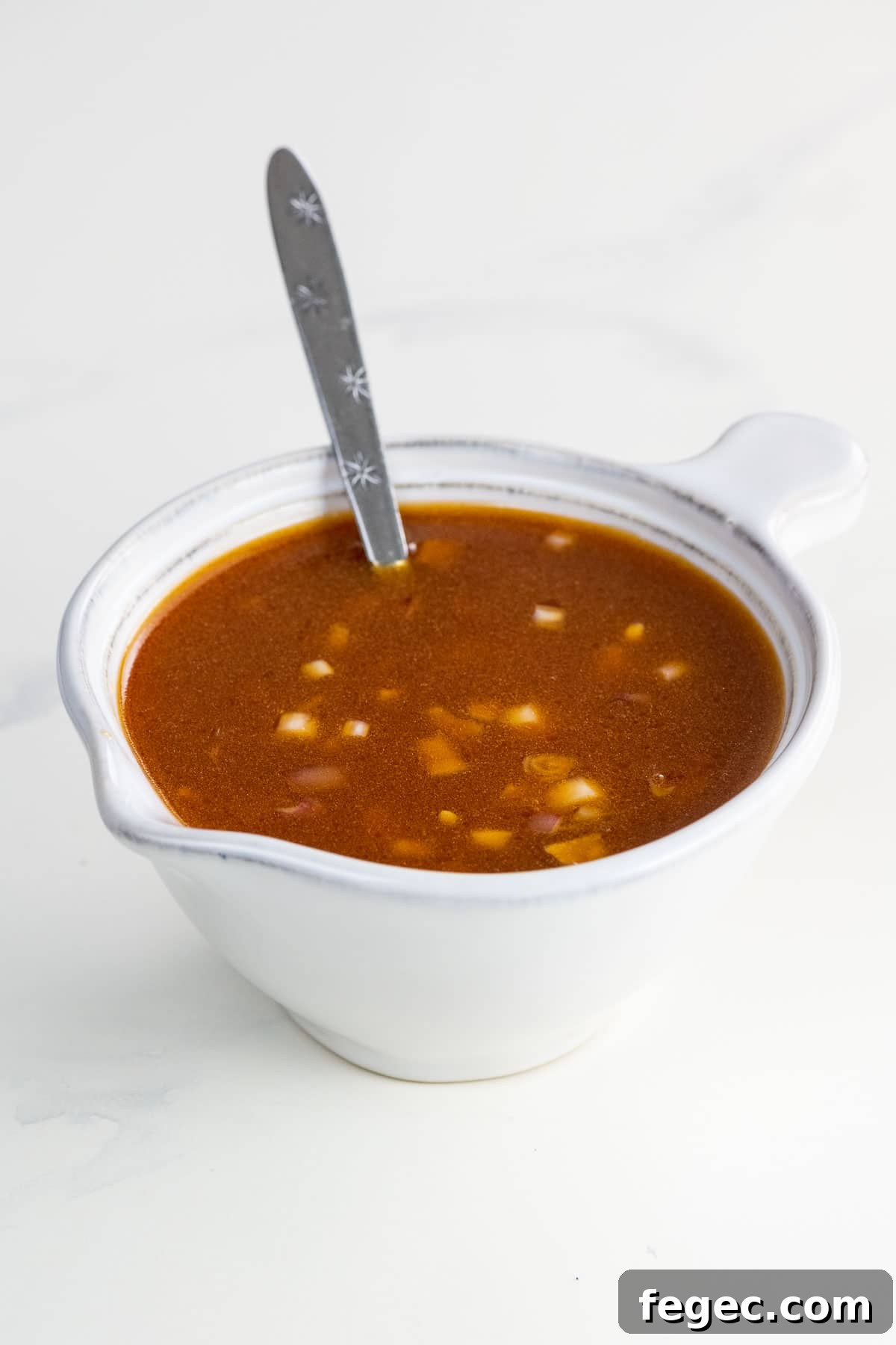 citrus vinaigrette in a small pitcher