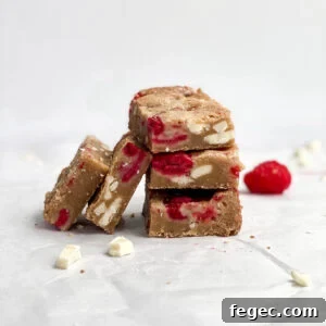 White Chocolate Raspberry Blondies Recipe — Chewy Fruity Bars 17 White Chocolate Raspberry Blondies stacked