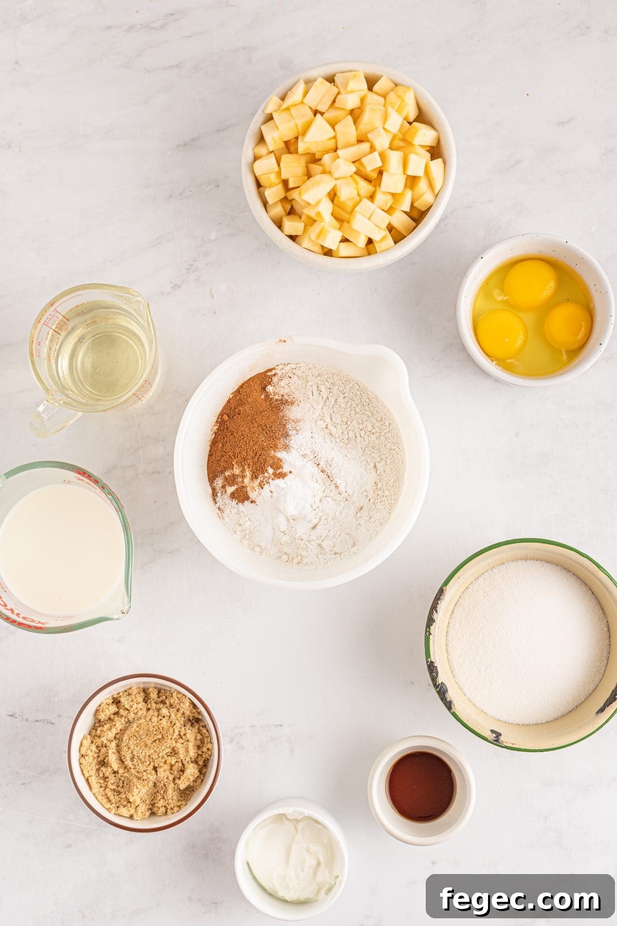 Portioned out ingredients with the dry ingredients in a mixing bowl.