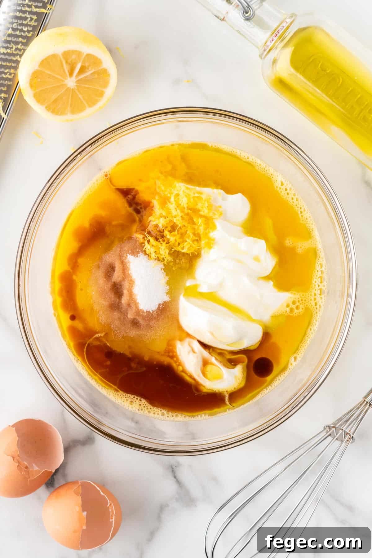 adding the wet ingredients to a mixing bowl