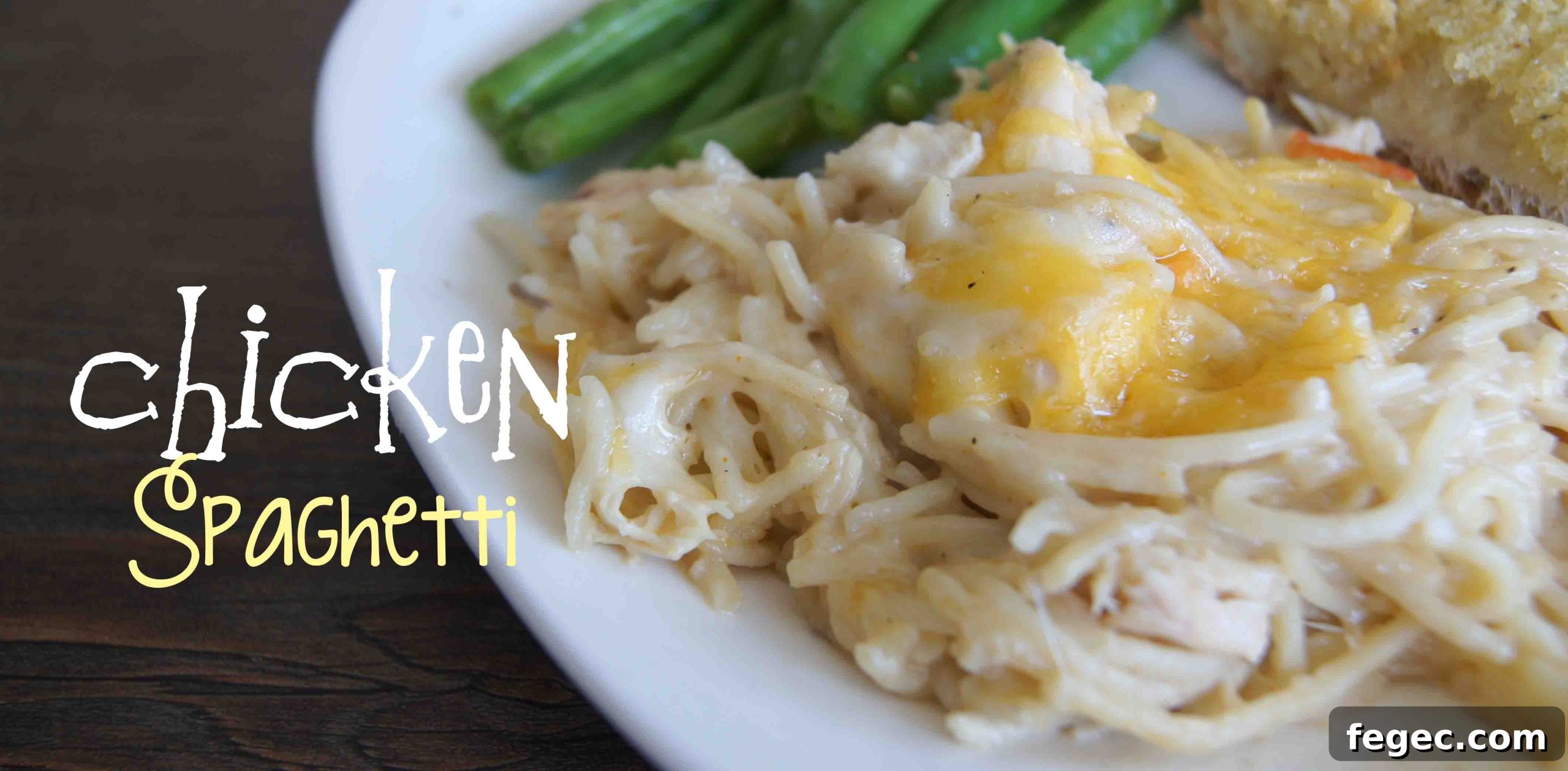 white plate with chicken spaghetti on it