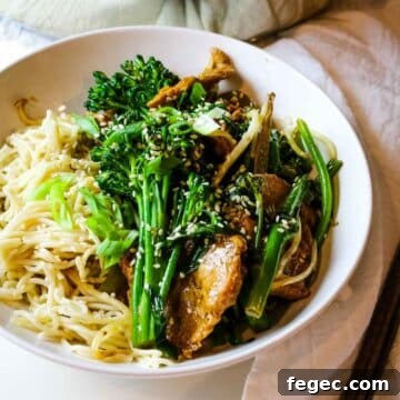 spicy pork with veggies over ramen