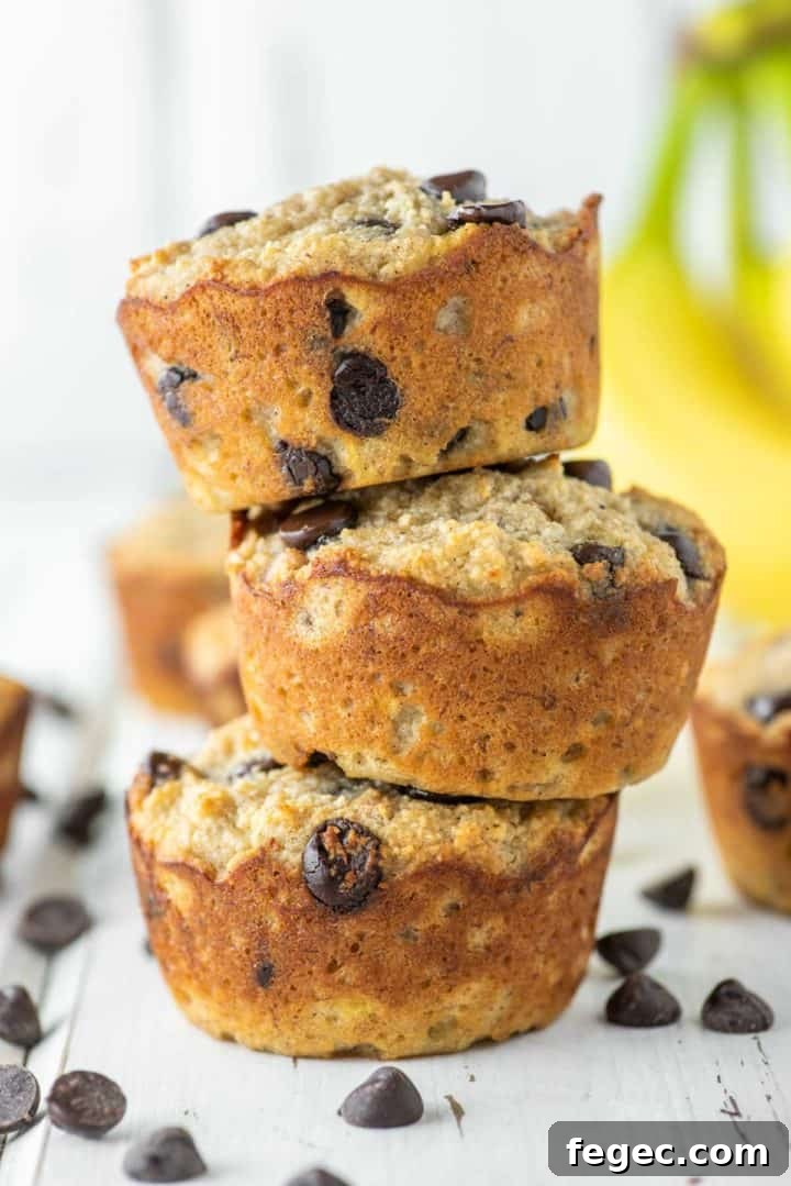 3 stacked banana muffins on top of each other made with almond flour.