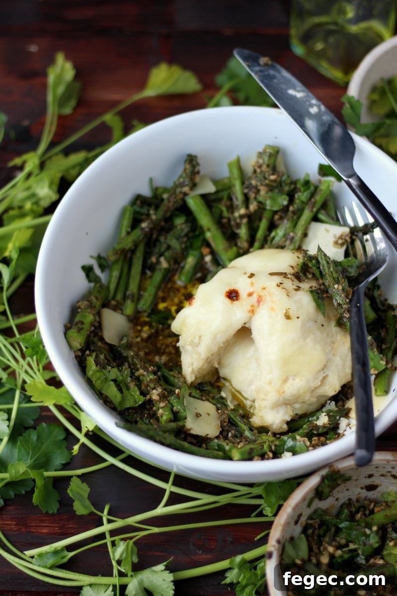 Cheese-Stuffed Dumplings + Pesto and Roasted Asparagus. The perfect meatless meal! thewoodenskillet.com