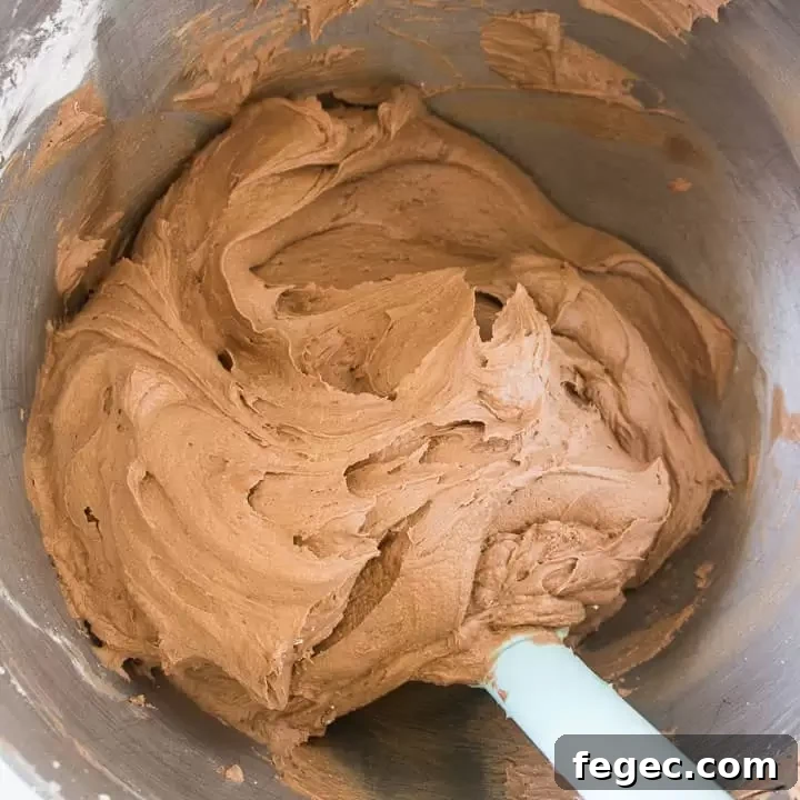 overhead shot of buttercream frosting for the tuxedo cake