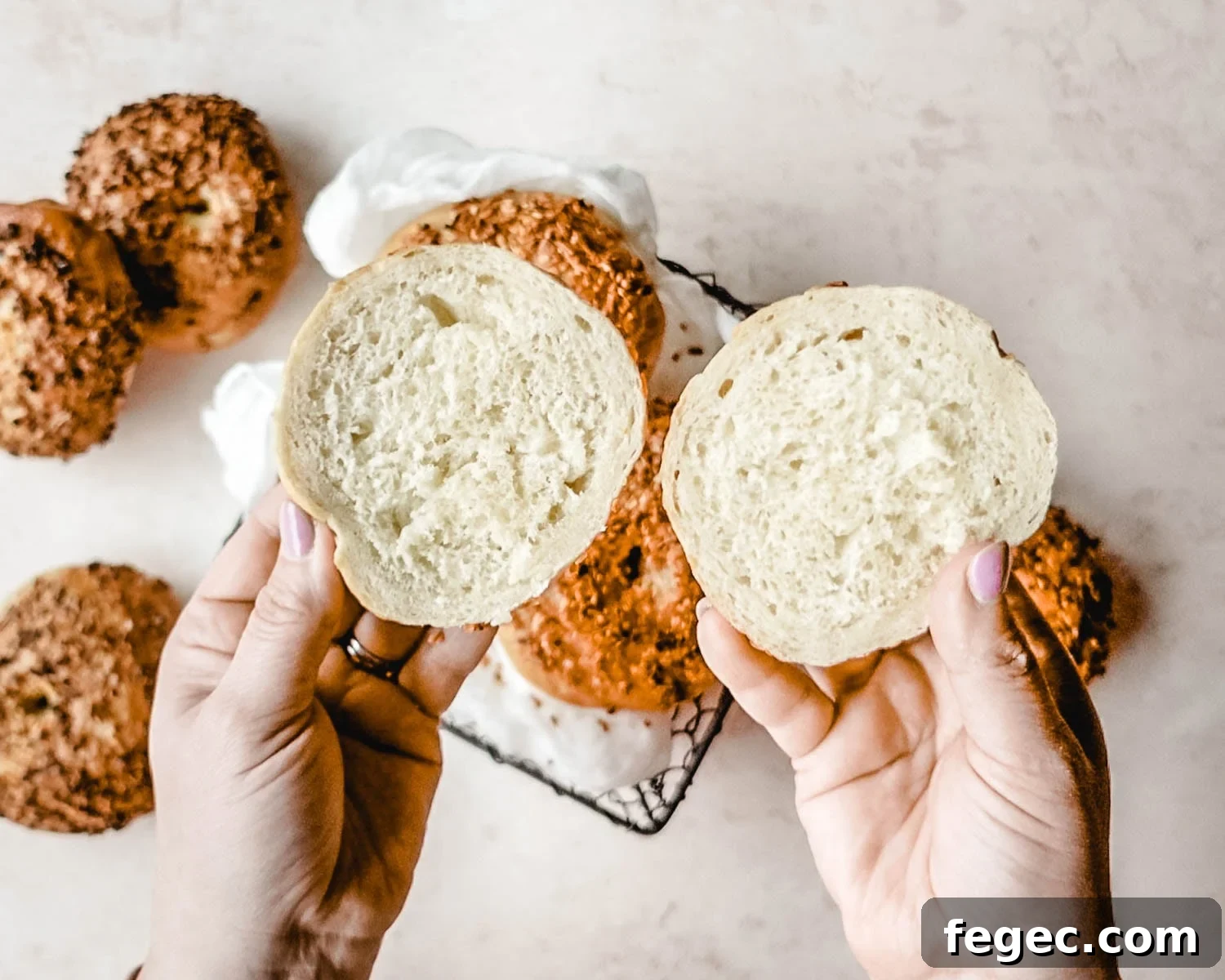 Homemade Onion Bagels: Authentic Recipe Ready in 3 Hours 15 Slice into a homemade onion bagel to see the chewy inside.