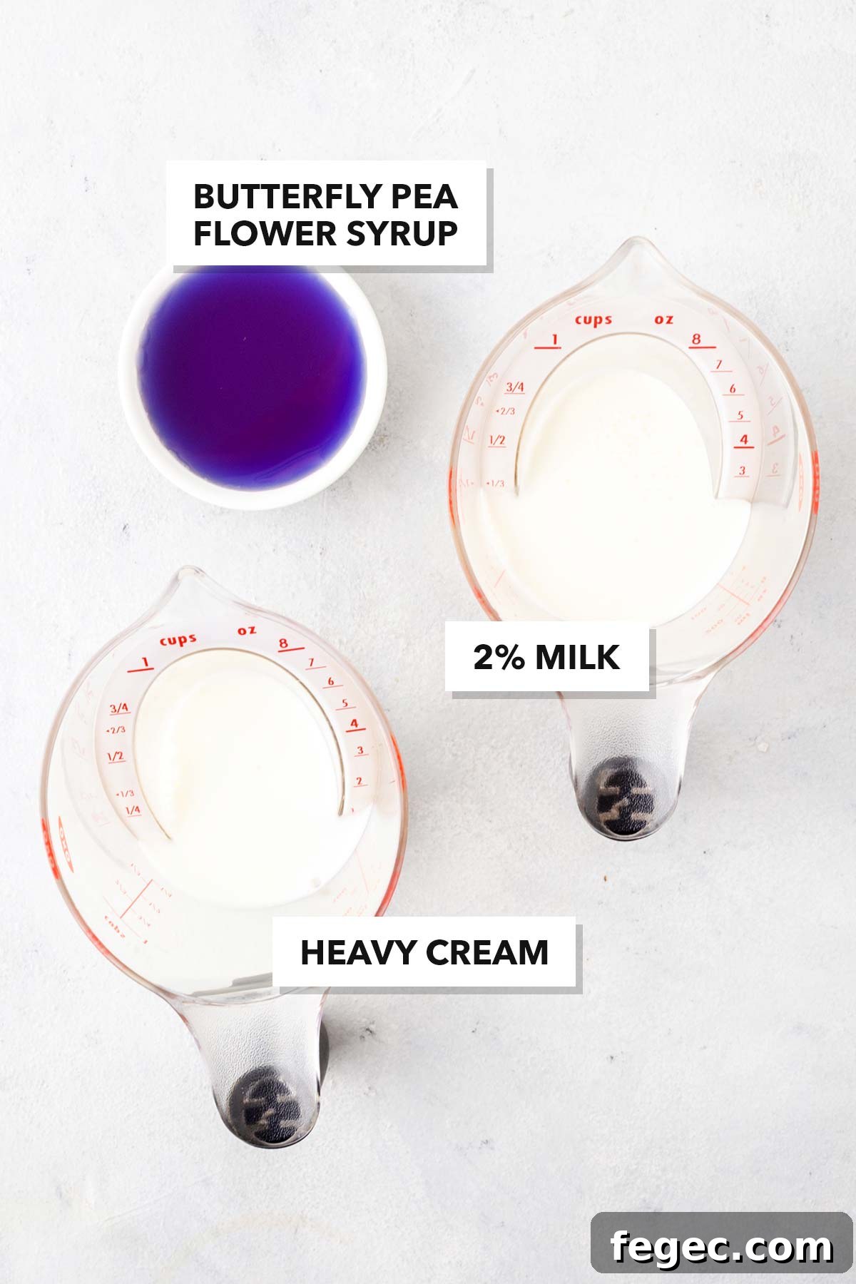 Butterfly Pea Flower Cold Foam ingredients in measuring cups and labeled.