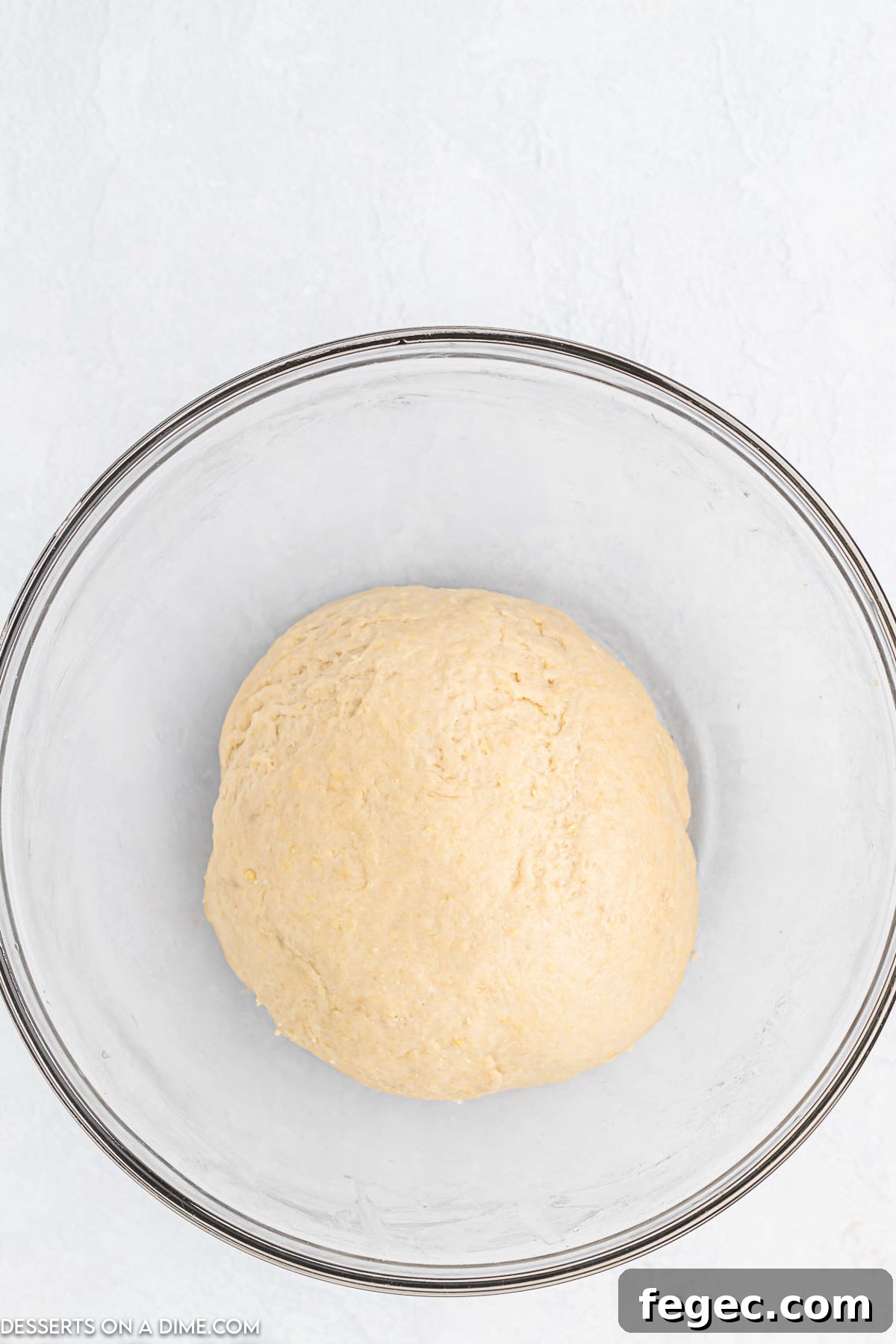 Dough combined in mixing bowl.
