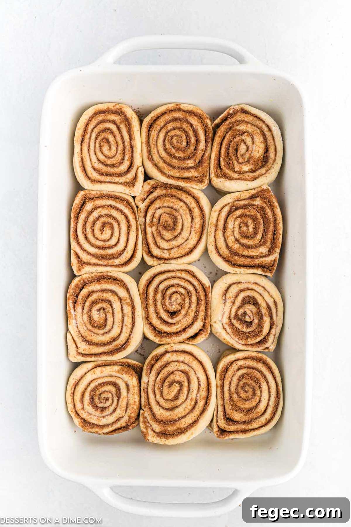 Cinnamon rolls in baking dish.
